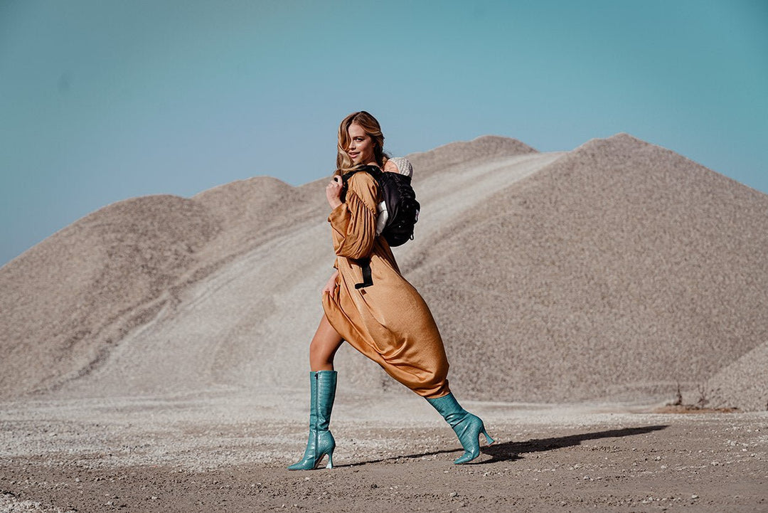 Warum soll das Baby in der Babytrage nicht mit dem Gesicht nach vorne getragen werden? - KOKADI